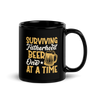 Surviving Fatherhood One Beer At A time Black Glossy Mug