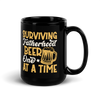 Surviving Fatherhood One Beer At A time Black Glossy Mug